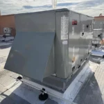 New 10-ton Carrier rooftop unit with electric heat and a fresh air damper