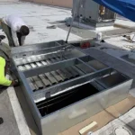 Our crew setting new curb work on the roof